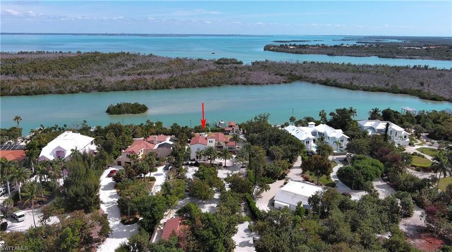 This extraordinary Spanish Colonial Revival waterfront estate spans approximately two acres of pristine island landscape and is ideally situated directly across from golf cart–accessible deeded beach access. Offering the rare combination of Gulf access and private waterfront living, this property presents a truly exceptional opportunity on Captiva Island.  The main residence is thoughtfully designed to accommodate four spacious suite-style bedroom areas, including a stunning primary retreat. Expansive living spaces include a grand great room, formal dining area, wine cellar, and an exceptional game and recreation room ideal for entertaining. Distinctive architectural elements showcase the home’s authentic character, including exposed cypress beams, Saltillo tile flooring, and hand-fired decorative tile accents.

Please note: the estate presents a unique opportunity for customization. The main kitchen, guest bedroom(s), and associated bathrooms are not yet constructed, allowing the next owner to complete these spaces according to their own vision and design preferences.

A boater’s and angler’s paradise, the estate features an impressive and highly unique dock and entertainment complex with three boat lifts, two covered boathouses, and multiple outdoor gathering areas designed for both relaxation and hosting. The waterfront setting has been enhanced with lush landscaping, creating a serene and picturesque backdrop.   
Outdoor living is equally impressive, featuring an open pool area, multiple covered porches, and a poolside cabana complete with a fireplace—perfect for year-round island living.

In addition, the estate includes a fully serviced two-bedroom guesthouse with a modern, playful interior design, offering privacy and comfort for family and guests.
16615 Captiva Drive, PID 03-46-21-00-00005.0070. Tax amt is combined (16611 & 16615). 



Additional parcel included.  16615 Captiva Dr. Tax bill includes both parcels and lot lines are both lots.  All is approxament and must be verified  
 Legal: FR NE COR GL 3 SEC 3 RUN SLY ALG E LI SEC 3 1740 FT TO POB TH N 89 DEG 42 MIN