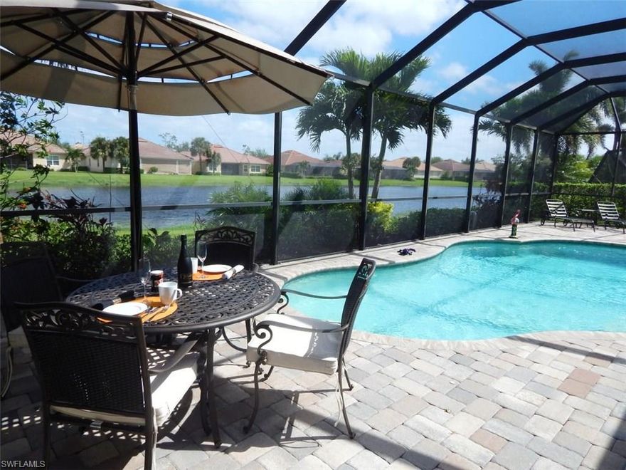 Enjoy your refreshing morning laps in your private pool overlooking the lake before you enjoy your breakfast on the screened lanai! Any more wishes? This gorgeous single family home fulfills highest demands and offers 3 Bedrooms, Den, 2 1/2 bathrooms, a large open living and dining room with open kitchen, breakfast bar, formal dining area, 2 guestrooms with Jack and Jill bath and a lot more. The owners upgraded with a lot of high quality purchases from the sales center: hurricane windows, huge outdoor kitchen, exclusive master bathroom, high end tiles in the living areas and wooden floor in the den, crown molding and 8 ft high doors. The lot at the corner of Doverstone St and Yorkstone Dr is more open and larger than other lots around. And with a slight NNW rear exposure you have a panoramic lake view with full privacy. Living in Hawthorne means living in a very attractive community with a lot of owners living there all year round. Amenities are two community pools, fitness center, club house, tennis courts and much more. Everything you need is nearby in a prospering area of Bonita Springs. This home won't last long, come to see it, don't be late.