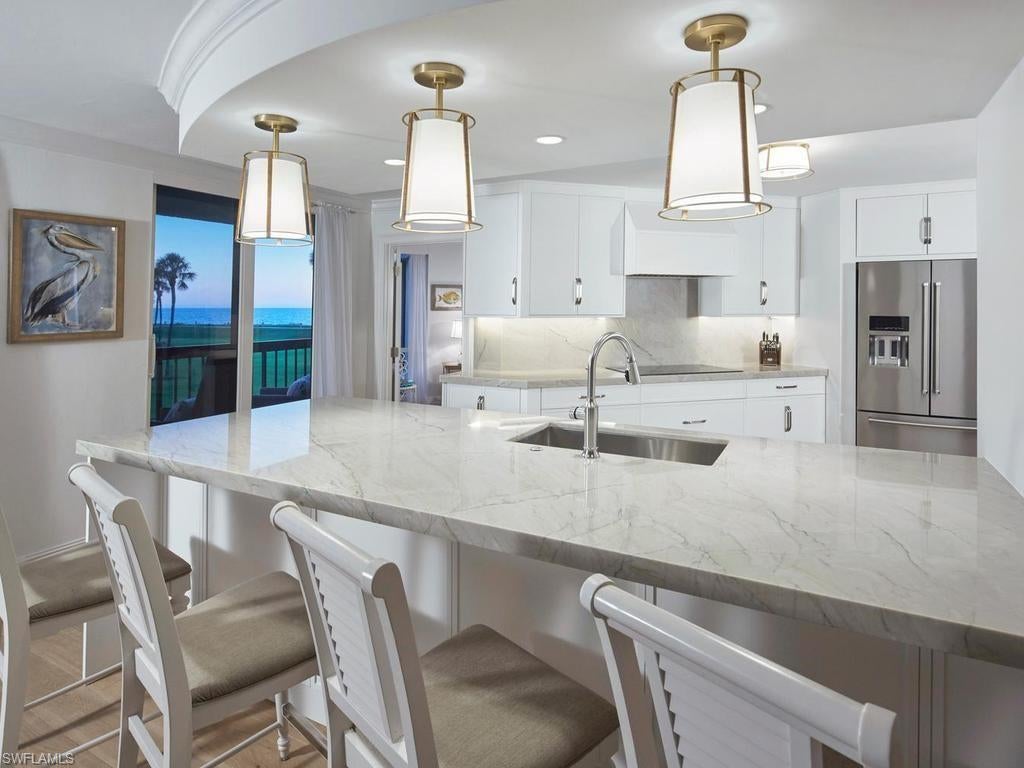Photo of 4551 Gulf Shore BLVD N #204, NAPLES, FL 34103 (MLS # 226019778)