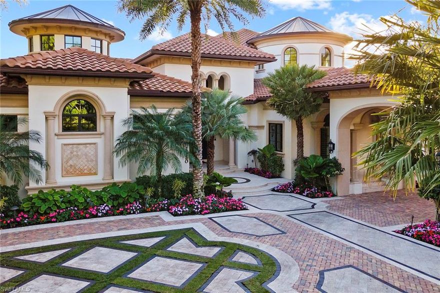 The quintessential Escada Estates home, custom-built by London Bay, is one of only 31 estate homes in this exclusive enclave. This beautifully landscaped property overlooks the lake and the 14th hole of the Gold Course and boasts smart home technology, a custom home theater with a 120" screen, two fireplaces, marble and hardwood flooring and a massive stone kitchen and brick wine cellar. The first-floor master wing includes a sitting room, private screened porch, spa-like bath and laundry room. The lovely first floor en-suite guest casita enjoys a private entrance. The outdoor area is truly exceptional with an expansive covered lanai with electronic screens and shutters, stone fireplace and well-appointed outdoor kitchen, making alfresco entertaining a pleasure. The saltwater pool and spa are oversized with extensive landscaping and spectacular flowers. Whole house 60 KW generator and water filtration system make this an all-inclusive retreat.