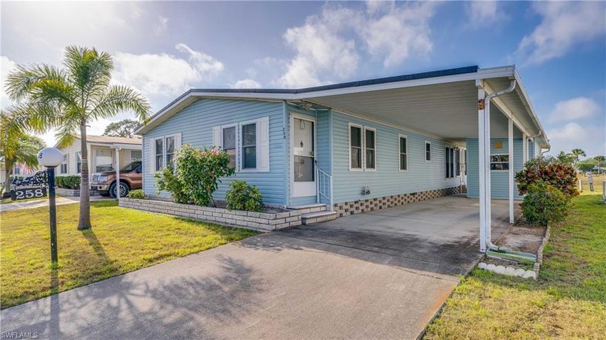 Welcome to this charming 2-bedroom, 2-bath manufactured home in Horizon Village, one of North Fort Myers' most sought-after, amenity-rich communities! With 1,600+/- square feet of living space, this home offers comfort and versatility, featuring a spacious living room, dining room, and a cozy breakfast room. The kitchen is a standout, offering abundant storage and plenty of counter space, perfect for those who love to cook and entertain. In addition to the main living areas, you'll find two inviting bonus rooms, one currently used as a sunroom, and the other offering endless possibilities as a home office, hobby room, sitting room, or den. Both rooms provide stunning lakefront views, allowing you to enjoy the serenity of the water right from the comfort of your home. An outside patio, also lakefront, provides the perfect spot to relax and take in the beautiful surroundings. The property is nestled on a quiet street, offering peace and privacy, yet remains close to all the community’s incredible amenities. Low HOA fees of just $300 per month make this a perfect place to call home. Recent updates include a membrane roof installed in July 2022, hurricane shutters, and decorative shutters that enhance its curb appeal. An outside shed adds extra storage space, and with shares valued at $104,000 included in the list price, this home is an incredible value. Priced to sell!