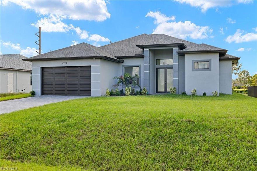 Welcome to this modern and elegant residence in an desire area of Lehigh Acres, just minutes from Buckingham Field, Fort Myers, Interstate I-75 and Southwest Florida International Airport (RSW). This 3 bedroom, 1 den, 2.5 bath home features a split floor plan with many upgrades for you and your family. For your safety, it has hurricane impact doors and windows. Sleek cabinets, granite countertops and stainless steel appliances. This house has ceramic coating throughout the house. The split floor plan provides additional privacy to the master bedroom and the master bathroom has spa-like features: separate shower with dual shower heads, double vanities and dual walk-in closets. Updated with light fixtures throughout the house. Outdoor kitchen, half bath for future pool or outdoor activities, spacious patio, automatic sprinkler system, paver driveway, epoxy coated garage floor. Interior photos shown do not reflect the actual color of the tiles, light fixtures or countertops in the property. Schedule your visit today to see this gem in the process of completion. CO ISSUED 4/25/25