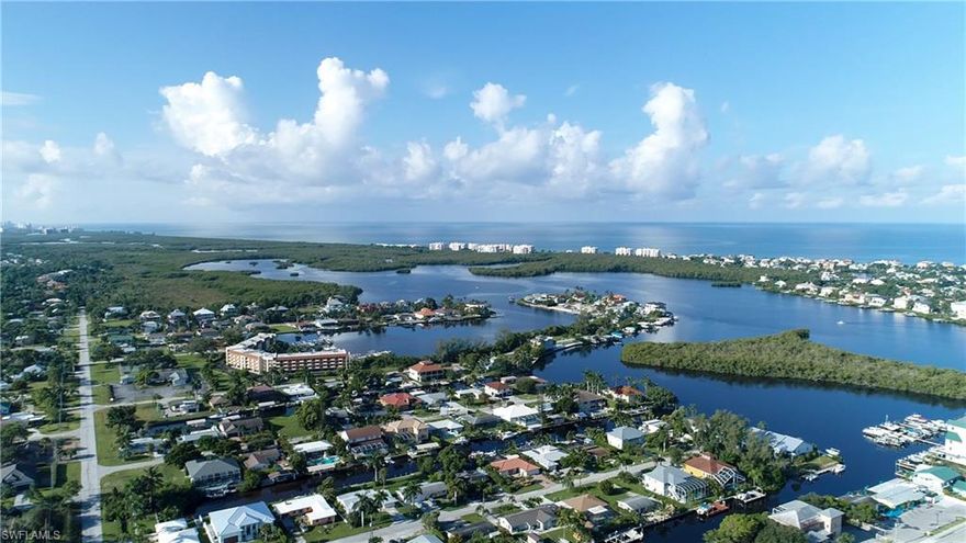 Direct gulf access. This property is an investors or builders DREAM! MAKE AN OFFER! With direct gulf access, this property makes a great location for anyone wanting to experience waterfront living. The property allows for beautiful sunsets, relaxation and fishing at any opportunity.When you're not out on the water, you are just a quick car or bike ride to Bonita beach or Barefoot beach. Located near the beach you are close to some of Bonita's best dining locations. Check out this property while you can!