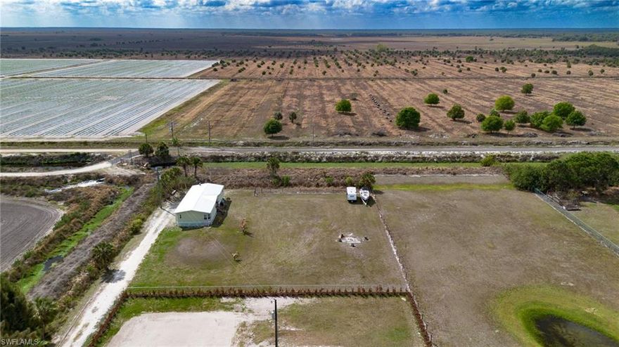 Peaceful Rural Living in Flaghole – Fully Remodeled & Move-In Ready , Full Furnished

Escape the noise and enjoy the peace and quiet of country living in Flaghole, Clewiston Florida. This beautifully newly remodeled home by Homes of Merit offers quality construction and modern updates while being conveniently located just 14 miles from Clewiston and 29 miles from LaBelle. Both Florida coasts are only about an hour and fifteen minutes away, making weekend beach trips easy.

Situated in a quiet area at the end of the road, this property offers a true sense of privacy and relaxation. The home is located outside of a flood zone, meaning no flood insurance is required, and features city water service and mail delivery directly at the property.

Inside, the home has been thoughtfully updated and is move-in ready, featuring:
 • New Metal Roof
 • New A/C System
 • New Windows
 • New Appliances
 • New TVs Included
 • Fully Remodeled Interior

Built by Homes of Merit, known for their quality craftsmanship, this home provides durability, comfort, and modern upgrades throughout.

If you’re looking for quiet rural living with convenient access to nearby towns and the Florida coasts, this property is a must see.