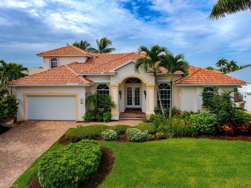Open Water Views with Over-sized Bay and Large Dock with Lift. 5 Bedrooms and 3 Baths Plus Den in this 2 story Open Floor Plan with Kitchen connecting the Family Room and Covered Porch. Formal Living Room and Dining Area. Second Floor Boasts 2 Bedrooms with a Guest Room that will keep guests longer than you want. Second Floor Suite with Balcony Overlooking the Large Pool with Spill-over Fountain, Lush Backyard and Breezy Bay.  Close to the Beach and Gulf Access -  Boaters Have Extra Height for Vessel's - Clearance of 14 feet +.  Hurricane Shutters Throughout - Combo of Electric and Manual. New Roof, Main Floor A/C, Hot Water Heater, Washer/Dryer, Refrigerator.  Insta-Hot connection in Master Bathroom for Instant Warmth!  Custom JJ Baker Home, Built to Today's Hurricane Standards. Currently in Rental Program for Extra Income.