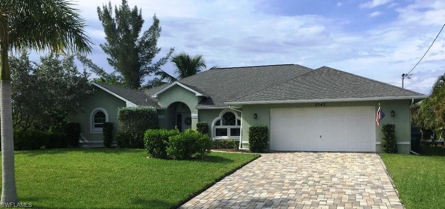 Here is an excellent opportunity to enjoy the southwest Florida waterfront lifestyle! This nicely updated pool home sits on a 130 foot wide gulf access canal. From the paver driveway to the beautiful landscaping you'll fall in love as soon as you drive up. Located on a quiet street of very nice newer waterfront homes. The heart of this home is the beautiful kitchen with raised panel cabinets, crown molding, granite countertops and newer appliances. The kitchen is open to the family room and it is perfect for entertaining with a nice large breakfast bar and eat in kitchen. Plus formal dining room and separate formal living. Master suite is spacious and beautifully updated. New cabinets with vessel sinks and granite countertops. Large walk-in shower and separate soaking tub plus two walk in closets. Split bedroom floorplan with three nice size guest suites with an nicely updated guest bathroom. The lanai has plenty of covered outdoor seating space plus a freeform heated swimming pool. At the waterfront you'll enjoy a very large dock, perfect for parties, sunbathing, fishing and so much more! High desired area of a newer waterfront homes. Great location, home and opportunity!