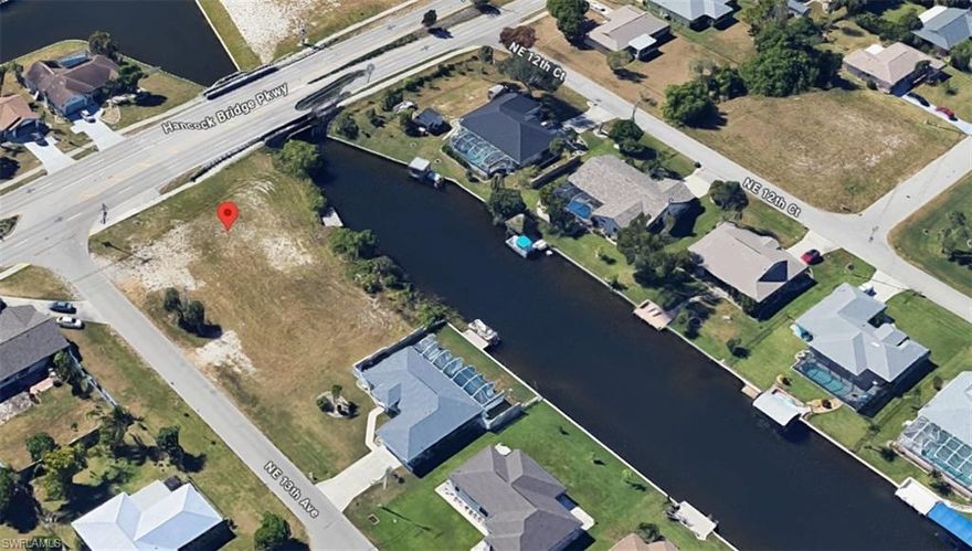 This remarkable freshwater lot with seawall, dock and Assessments paid is now available!! Navigate to several lakes... Close to shopping, schools, Restaurants, etc.  Perfect location to build your dream home or investor opportunity.