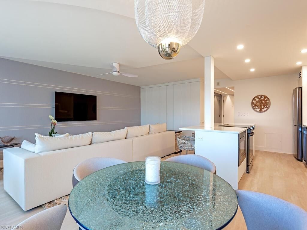 Photo of 3410 Gulf Shore BLVD N #202, NAPLES, FL 34103 (MLS # 225077184)