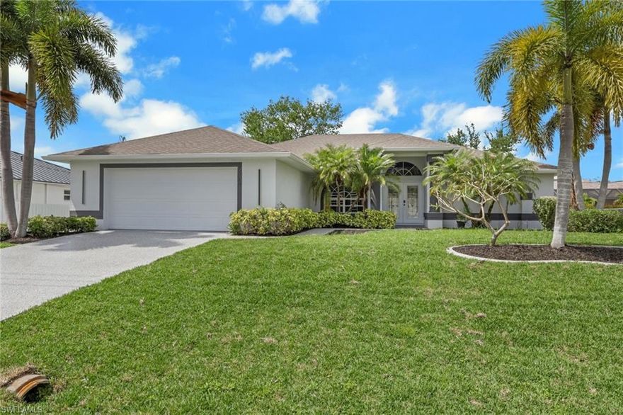 Stunning Completely Remodeled Pool Home! 4BR/3BA pool home with city water, sewer, and irrigation—all ASSESSMENTS PAID. Features a modern chef’s kitchen with breakfast island, custom cabinetry, granite countertops, and stainless-steel appliances. Luxurious open floor plan with porcelain tile throughout and a custom media wall with electric fireplace. Upgrades include motorized blinds and smart toilets. Spacious primary suite offers high-end finishes and large walk-in closets with built-in cabinetry. Step outside to your private pool area, perfect for soaking up the Florida sunshine year-round. Conveniently located within walking distance to Sam's Club, and close to shopping, schools, and parks in a great neighborhood. Do not miss this opportunity to own a move-in-ready, upgraded home in one of Southwest Florida’s most sought-after areas.