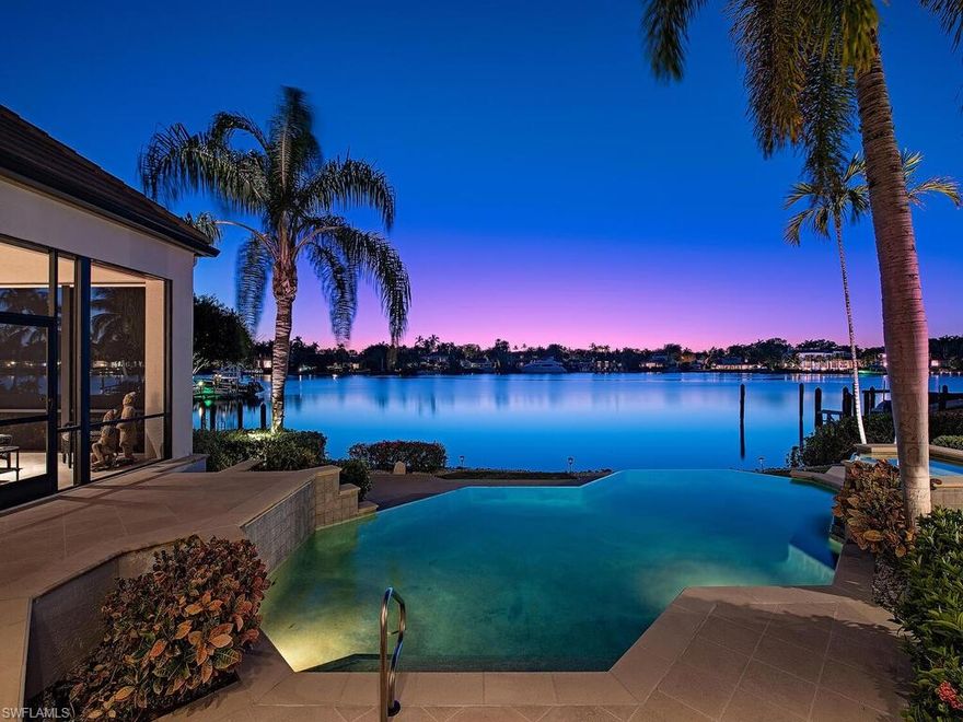 Incredible, wide-water, western exposure over Treasure Cove! This custom home designed by John Cooney offers a fantastic Floorplan, incredible light, and sweeping views over Port Royal's most treasured waterway. With 136' on the water, boater's will have plenty of options for dockage. Meticulously cared for by the original owners the home has been freshly painted on the exterior, and a new roof added in 2019. Master bedroom, and guest casita are downstairs and offer amazing water views. There is a bonus room, and 2 additional bedrooms up, elevator and 3 car garage. A direct Port Royal membership property.