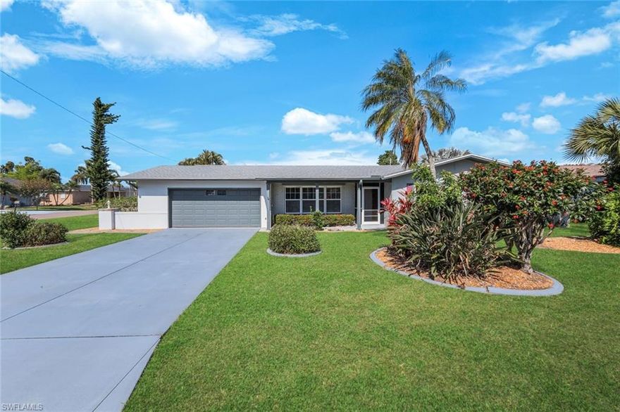 Move-in ready and completely remodeled, this charming pool home is located in one of Cape Coral’s most sought-after neighborhoods, just a short bike ride to downtown Cape Coral. Offering 3 bedrooms, 2 bathrooms, and an attached 2 car garage, this home features over 1,300 square feet of beautifully updated living space. Inside, you will find vinyl and tile flooring throughout, complemented by fresh interior paint that creates a light and inviting atmosphere. The updated kitchen offers new stainless steel appliances, modern countertops, and a convenient pantry. The spacious owner’s suite features sliding glass doors to the lanai, a walk-in closet, and a fully remodeled en suite bathroom with a large subway tile shower. Enjoy peace of mind with a newer roof installed in 2022 and electric roll down shutters. The expansive lanai has been enhanced with Plexiglass sliders, creating additional air conditioned living space perfect for year round enjoyment. Step outside to your private screened in heated pool, ideal for entertaining or relaxing. The oversized corner lot is beautifully landscaped and includes a fully fenced backyard, offering plenty of space for pets or outdoor activities, along with mature fruit trees for a true Florida touch. Conveniently located just minutes from downtown Cape Coral, Cape Harbour, and Tarpon Point, with easy access to Sanibel, Captiva, and Fort Myers Beach, as well as shopping, dining, medical facilities, and top rated schools, this home truly captures the best of Southwest Florida living. Schedule your private showing today.