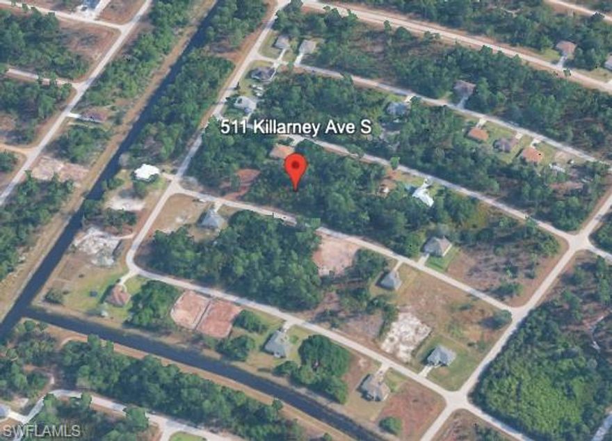 Buildable residential lot in a growing area of Lehigh Acres—ideal for investors or builders looking for their next opportunity.

Positioned near a canal corridor, the property offers added spacing and a more open feel compared to surrounding lots. Located within a platted subdivision with no HOA restrictions and low holding costs.

Electric is available nearby, and the lot will require well and septic (standard for the area).

Located in an area experiencing ongoing residential development and builder activity, this parcel offers a straightforward path to development and strong future upside.

Whether you're planning to build now or hold for appreciation, this is a compelling value in today’s market.

Priced for immediate interest—bring your offers.