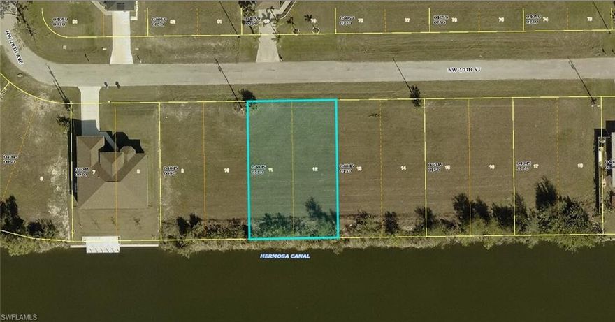 Don't miss this rare chance to secure a canal-front residential lot in an established Cape Coral neighborhood.

Whether you're looking to design and build your dream custom home from the ground up, or simply acquire a prime piece of Cape Coral real estate, this lot offers the flexibility to make it your own.

Situated along a peaceful canal in one of Southwest Florida's most sought-after cities, this property offers the quintessential Florida lifestyle — waterfront views, serene surroundings, and easy access to everything Cape Coral has to offer.

Highlights:

Canal-front residential lot
Established neighborhood setting
Ideal for custom home construction
Pre-construction marketing opportunity
Bring your builder — or we can connect you with one
This listing represents a pre-construction/pre-market opportunity. Contact us for full details on lot specifications, utility availability, and build options.