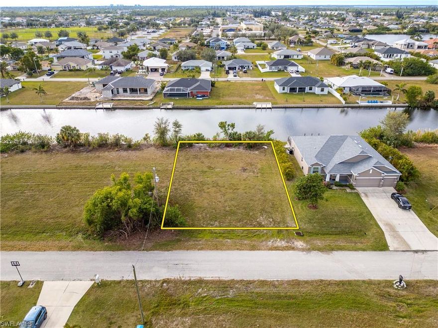 This vacant lot in northwest Cape Coral offers the perfect combination of quiet living and city conveniences, ideal for building your new home. The lot sits on a freshwater canal perfect for fishing, kayaking, or boating, and nearby boat launches, like the Matlacha Boat Launch or Burnt Store Boat Ramp, provide easy access to saltwater fishing and the Gulf. Just minutes from shopping, restaurants, schools, and community activities, and a quick 30 minute drive from the Punta Gorda Airport, you have SW Florida at your fingertips. Don't miss your opportunity to create your dream home on a tranquil, canal-front lot in this still-developing area in northwest Cape Coral.