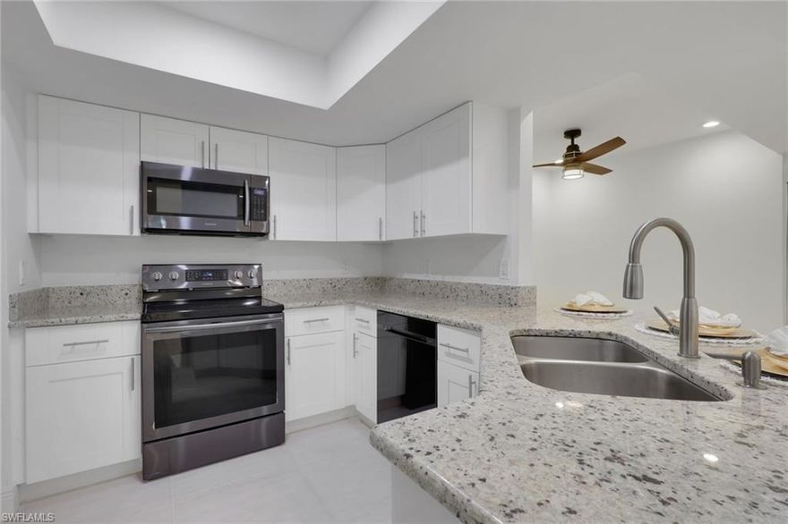 Completely updated 2 bedroom 2 bathroom condo in the conveniently located community the greens within fountain lakes. Screened in balcony overlooking a wooded area gives it a tranquil and private feel. Laundry room inside the unit right off of the kitchen with black stainless steel Samsung washer and dryer. A big plus and very little units have this feature are the brand new hurricane impact windows and sliders in the unit, huge update. Spacious with breakfast island, white shaker cabinets, granite counters and black stainless steel samsung appliances. Unit was recently painted and grout renewed throughout tile flooring. Both bathrooms have been updated with main bathroom offering a single vanity with walk in shower, and guest bathroom a shower tub combo with single vanity. Plumbing has been replaced to new standards. 
The greens at fountain lakes offers its own private pool area which is very close to this unit as well as tennis. The main club area at fountain lakes features a 9 hole golf course included in your hoa fees, as well as fitness room, another main club pool, pickle ball, tennis, basket ball, playground, grill area, shuffle board and bocce ball. Close to shops, restaurants, short commute to the airport and of course all the sandy beaches of SWFL