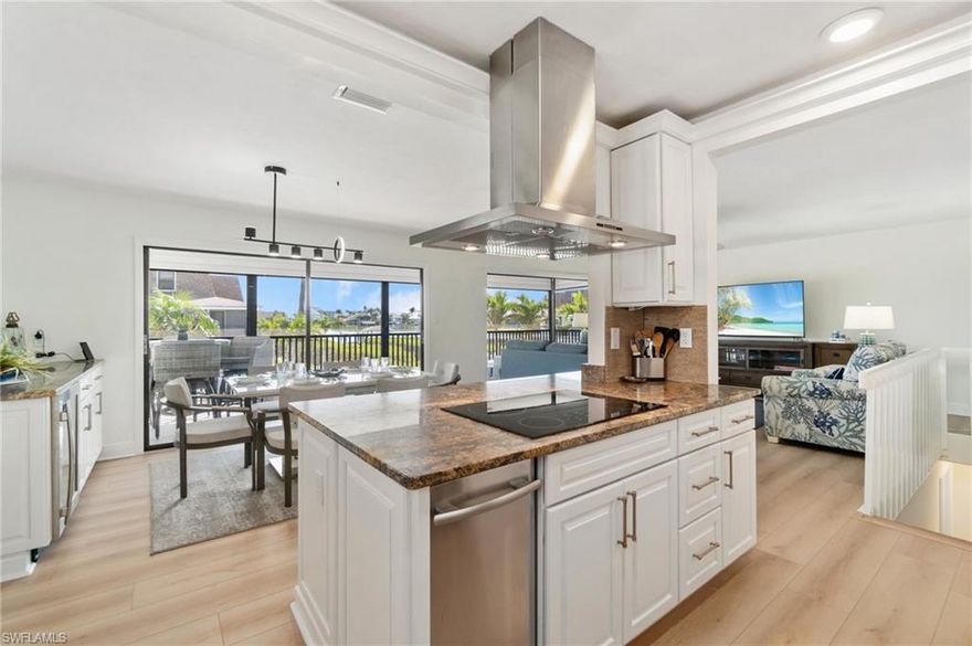 NEW! AVAILABLE WINTER 2026!
Welcome to Bonita Beach Cottage, a charming retreat perfectly situated directly across from Bonita Beach Access #6. Whether you're traveling with family, friends, or as a couple, this beautifully renovated 3-bedroom, 3-bathroom beach house with heated community pool offers the ultimate blend of bayfront tranquility and beachfront convenience.

Wake up to stunning bay views and catch glimpses of the Gulf of Mexico from your private elevated deck. Enjoy your morning coffee as the sun rises over the water, or sip evening cocktails while watching the sunset — every moment here feels like a vacation dream.

PRIME LOCATION:
Steps from Bonita Beach with easy public access across the street. Private boat dock with direct Gulf access — perfect for boating enthusiasts. Close to boutique shops, waterfront restaurants, and popular local attractions

THE LAYOUT:
This open-concept, light-filled home comfortably accommodates up to 6 guests with tasteful coastal décor and modern comforts.
Living Area: Cozy seating, smart TV, and a laid-back, beachy setting
Kitchen & Dining: Fully equipped kitchen with modern appliances, breakfast bar, indoor dining, plus outdoor dining on the deck
Primary Suite: King bed, spacious closet, and ensuite bathroom with a walk-in glass shower
Guest Bedroom: Queen bed with easy access to a full bathroom featuring a walk-in shower
Third Bedroom: Pullout sofa bed — ideal for kids or extra guests

OUTDOOR LIVING:
?Spacious private deck with stunning bay views, sun loungers, and a dining area
?Gas grill for sunset BBQs
?Two bikes available
?Kayaks, paddleboards, and additional bikes available for rent — delivered right to your door
?Private boat dock for fishing, boating, or simply relaxing by the water

INCLUDED AMENITIES
? Beach gear — chairs, towels, umbrellas, cart, and toys
? High-speed Wi-Fi & Smart TVs in every room
? Fully stocked kitchen, laundry, and all the essentials for a comfortable stay
? Outdoor lounge and dining areas for making the most of the Florida sunshine

Bonita Beach Cottage invites you to experience the best of bay and beach living. Whether it's lazy days on the sand, adventures on the water, or sunset dinners on your private deck, your perfect coastal getaway awaits. Book Your Beach Escape!