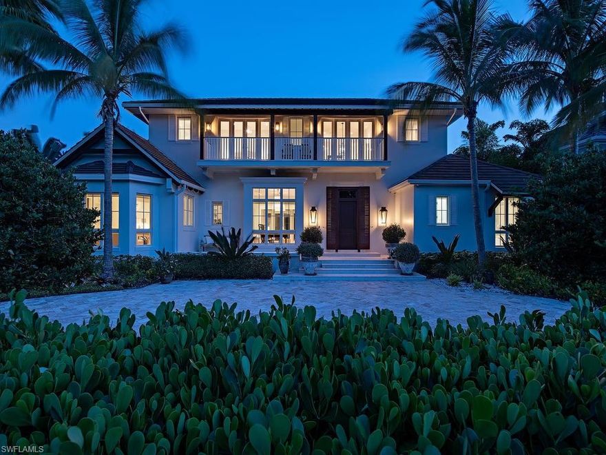 A fantastic home located steps from the beach! Perfectly positioned on a coveted, oversized, Southern exposure lot on one of Old Naples prestigious Mahogany tree lined streets. Quality construction. Expansive spaces. Ideal location. This home is set apart from all others with its’ private gardens, gracious outdoor living areas, secluded guest quarters, and finishes of the finest quality. A full concrete structure encompasses rich wide plank Walnut flooring throughout, SubZero, Wolf and Miele appliances, Savant A/V System complete with Sonos and security cameras. You will find a gourmet kitchen, perfect for entertaining, featuring an oversized marble waterfall island, walk in pantry, and ample climate-controlled wine storage. Walking out to the thoughtfully designed covered outdoor living, pool and spa areas a sense of peace rests as there is complete privacy behind the lush plantings bathed is the southern sun.  Beyond the front door lies a very short stroll to the sand for sunset. Truly, a home that meets and exceeds the expectations offering timeless architecture and enduring value.  MOVE IN READY!