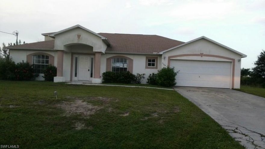 This home has great potential and one heck of a waterfront view. Almost 2900 sq ft of living space awaits your touch to make this a masterpiece. 260 feet of seawall with a concrete dock on a beautiful freshwater lake. Inside features a formal dining room and living room with a kitchen that opens into a large great room that has sliders to the lanai and pool area. The master has a walk in closest and the bath leads to a patio area by the pool. The other side of home has two bedrooms plus an addition that has a large den and a second floor with balcony that could be a separate master. Think of this home as a blank canvas awaiting your touch. Come and view today.