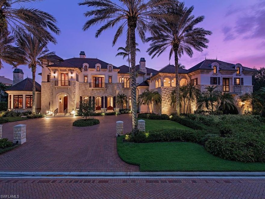 H.16296 - A palatial home ideally positioned with forever views of sunset skies and the manicured ninth fairway of the prestigious Bay Colony Golf Course. Elegantly appointed with the highest level of finishes and fixtures throughout, this thoughtful masterpiece exudes a rich European aesthetic with Venetian plaster, exquisite millwork, barrel-vaulted ceilings and inspired architectural details. Truly, an estate of this magnitude is the very definition of Grandeur: "Splendor and Impressiveness, Especially of Appearance and Style". Beyond the gallery foyer, there are many additional gathering areas for entertaining. A grand-sized gourmet kitchen w/ commercial grade appliances opens to a light filled morning room overlooking the magnificent resort style pool and water features, and there is a gracious room for formal dining, a large family room, billiards/game room with a stately mahogany bar and a handsome study with elaborate millwork. The master suite is pure opulence, with a sumptuous bedroom and separate his and her bathrooms befitting of royalty.  Two enormous walk-in closets. There are also five spacious guest bedrooms with en-suite baths, plus staff quarters.