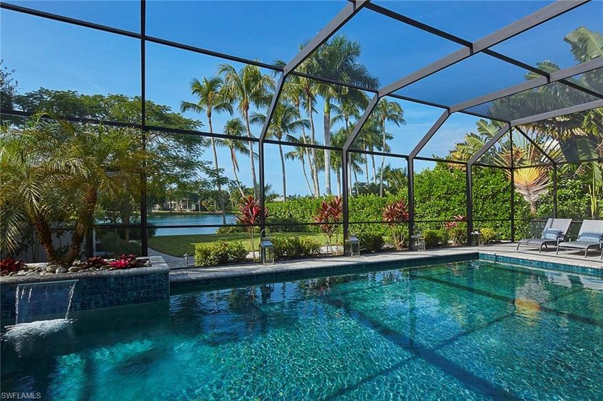 Tranquil, southwestern lake views were at the forefront of design in this spacious Old Naples single family home. Designed by renowned Chicago architect Laurence O. Booth, chic beach retreat features an open concept floor plan, which allows effortless entertaining possibilities in the vaulted-ceiling great room, the cozy den or on the covered lanai. Family and friends will enjoy views of the lake and pool while they gather around the large island in the streamlined kitchen. The elegant master suite is the ultimate retreat featuring French doors to the lanai and a large, spa-like master bath with a soaking tub and multi-head shower. A separate, grandfathered guest house is ideal for guests to feel at home while offering an unmatched lake view. Located close to white sand beaches and downtown Naples for gourmet dining and shopping.