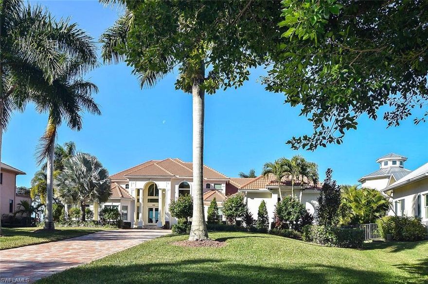 Here's a hot one! Water views from every room. Beautifully maintained and updates galore in this 2 story home located right on the Caloosahatchee River.  Enjoy the stunning sunsets every day. This home has a total of 4 bedrooms and 4.5 bathrooms, plus an office/den located on each the main floor and second floor. The master suite is located on the main floor. Some of the recent updates include a new beautiful open kitchen with granite countertops, all top of the line Wolf appliances. If you like to entertain then this is the home, with the new outdoor kitchen overlooking the new pool and hot tub, enclosed new pool cage and lanai pavers. Enjoy an evening outside near the new fire pit surrounded by lush landscaping. Oh, I almost forgot...this home has a new 4 car garage with a fabulous paver driveway! New A/C, new Roof, new boat dock with lift to take a ride to the beaches. Never worry about the Florida summer storms with a new whole-house generator plus hurricane protection! Make your appointment today to see this fabulous home; you will not be disappointed!