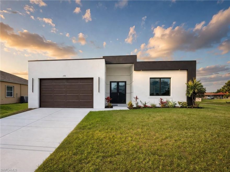 Experience modern, low-maintenance living in this well-designed home located in a desirable community. The open-concept layout features high ceilings and abundant natural light, creating a bright and welcoming atmosphere.

With 4 bedrooms and 3 bathrooms in a split floor plan, the home offers both comfort and privacy. The contemporary kitchen is equipped with quartz countertops, sleek cabinetry, and stainless steel appliances, seamlessly connecting to the living and dining areas.

The spacious primary suite includes a walk-in closet, dual sinks, and a glass-enclosed shower. Tile flooring throughout and impact windows add both style and durability.

Enjoy a covered patio overlooking a fully fenced backyard—perfect for relaxing or entertaining. Complete with a two-car garage and paved driveway, this home is conveniently located near shopping, dining, and more.

Schedule your showing today!