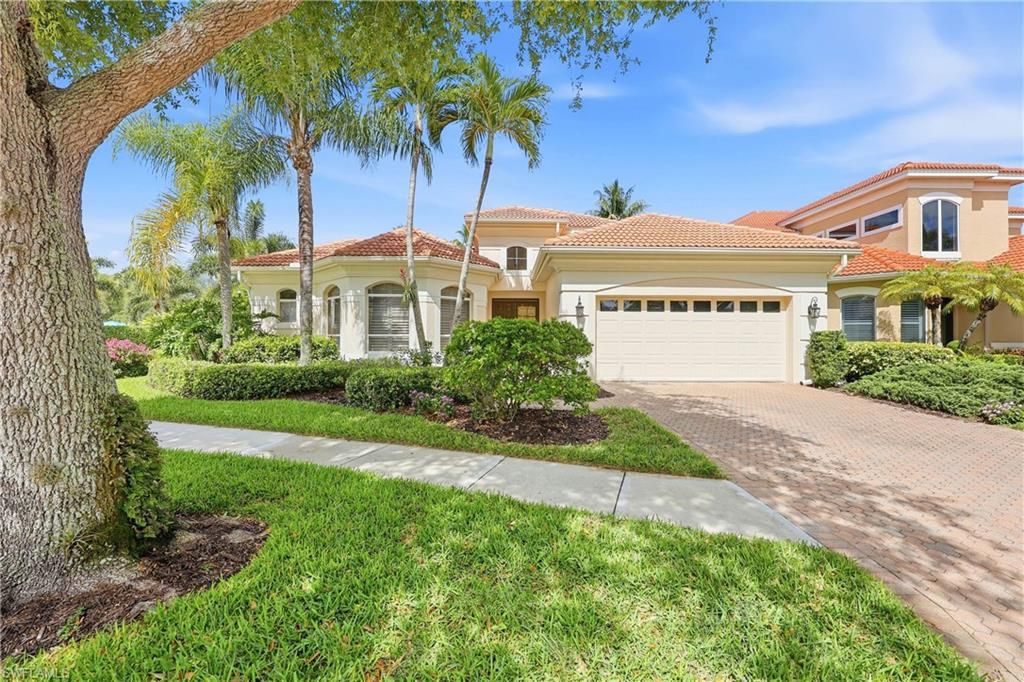 Photo of 9227 Troon Lakes DR, NAPLES, FL 34109 (MLS # 226009323)