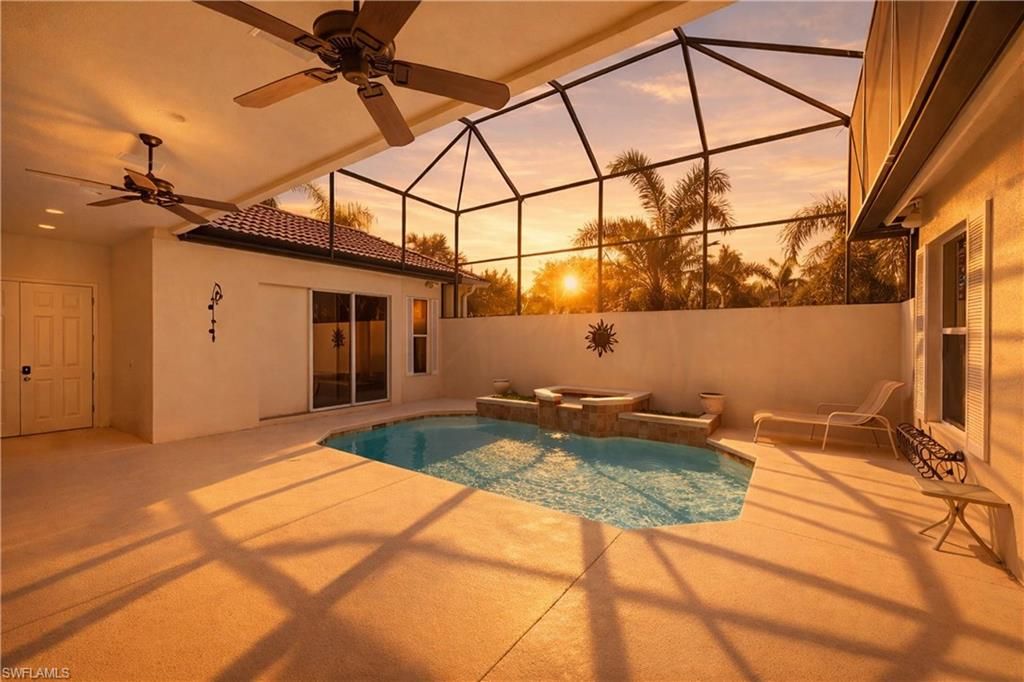 Photo of 9227 Troon Lakes DR, NAPLES, FL 34109 (MLS # 226009323)