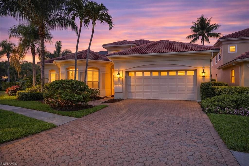 Photo of 9227 Troon Lakes DR, NAPLES, FL 34109 (MLS # 226009323)