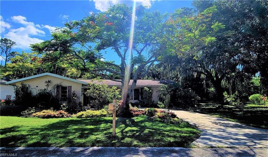 3 bedroom, 2 bath, pool home in the N. Ft. Myers Yacht Club Colony Neighborhood. A gardeners delight!!  Home includes adjacent lot with a beautiful park like setting. Mature oak trees that provide year round shade. Huge staghorn ferns, orchids of many varieties, fruit trees, and many more. Voluntary HOA membership ($150/year) delivers desirable amenities that include boat ramp, BBQ area, fish cleaning station, and a park with pavilion & 
breath taking water views! This is truly a unique property!