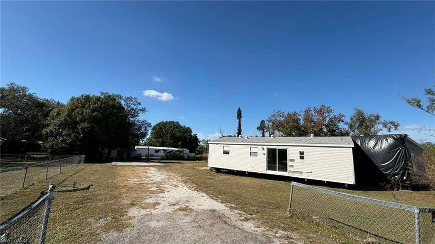 Discover the perfect opportunity to create your ideal home design.

The land previously had homes on site, and impact fees have already been paid, providing valuable savings for the next owner. The included uninstalled mobile home is Wind Zone 3 compliant, making it suitable for higher wind-load areas. Land ownership and clear mobile home titles add peace of mind and flexibility for future use.

Inside, the mobile home has been fully gutted, giving you the freedom to customize the layout and finishes exactly to your taste. Please note square footage is approximate

Square Footage is Approximate