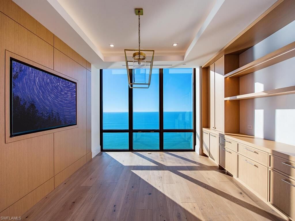 Photo of 4951 Gulf Shore BLVD N #101, NAPLES, FL 34103 (MLS # 226001860)