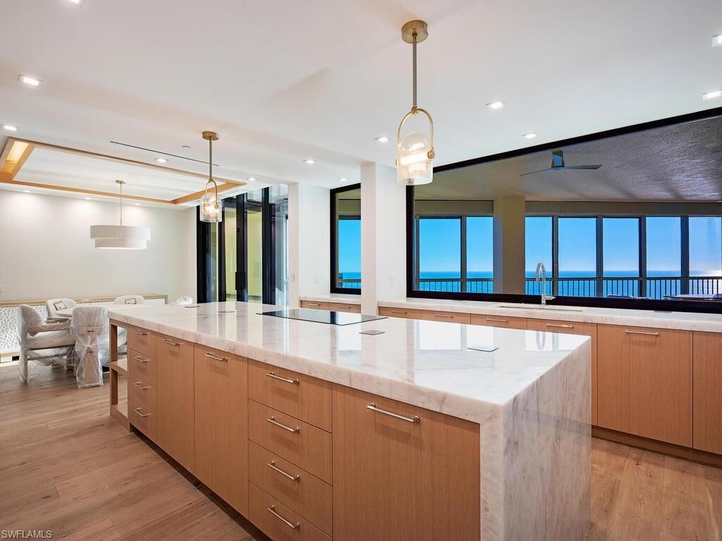 Photo of 4951 Gulf Shore BLVD N #101, NAPLES, FL 34103 (MLS # 226001860)