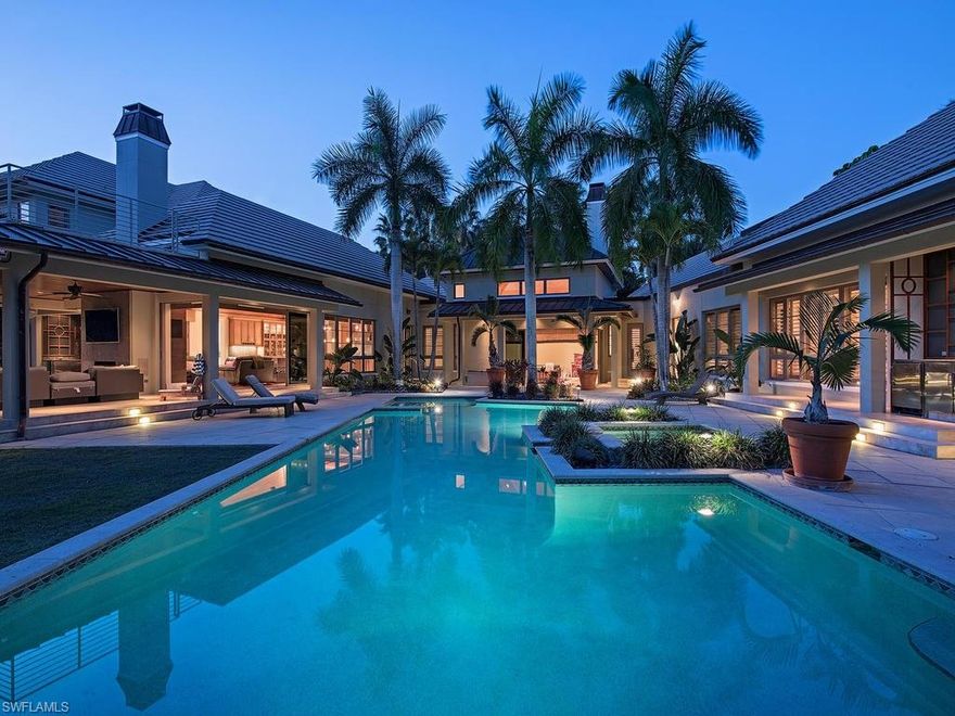 H.11580 - Spectacular Coastal Contemporary 5 Bedroom + Den home sprawls across its 7,009 Sq.ft. of living space with architecture reflecting clean, elegant lines and upscale finish.  This extraordinarily large lot is quietly sequestered on Yucca Rd, only 4 ½ blocks to the beach and has 185’ overlooking Naples Beach Club’s beautiful and newly renovated golf course.  The home boasts such features as soaring ceilings with tongue and groove pine, wood and marble flooring, 3 fireplaces, Lutron lighting, whole-home generator, Whole Home Automation, 3-car collector’s garage and much more.  The gourmet kitchen includes a butler’s pantry, top-of-the line appliances, large island and custom cabinetry.  The master bath is spectacular with its in-ground whirlpool spa, private shower with deluge head, natural rock water cascade and freestanding soaking tub.  Enjoy the 2nd floor with its very large media room and sun deck with big golf course views.  The resort like pool/spa is the perfect escape with a southern exposure, beautiful vistas, summer kitchen and covered or uncovered lounging locations. This property will be sure to impress even the most discerning of buyers.