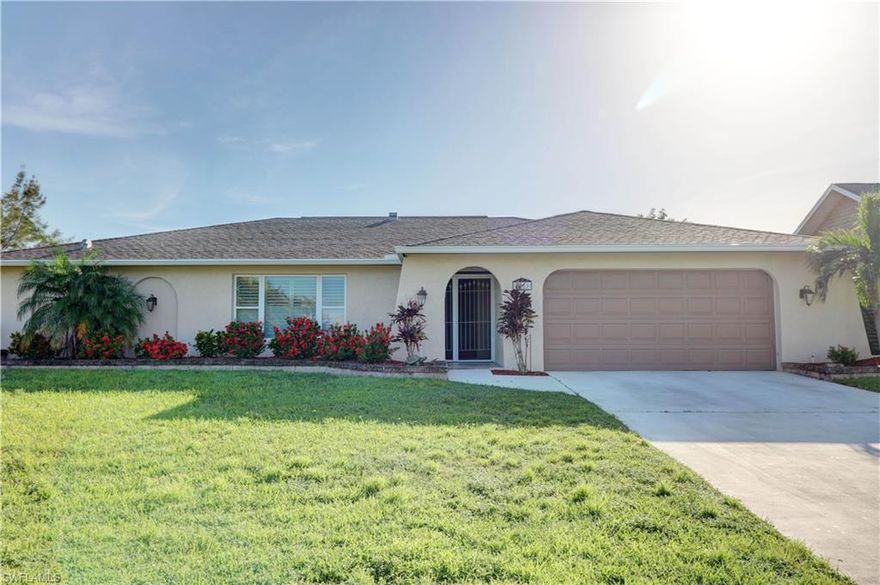 $10K PRICE REDUCTION!!! MOTIVATED SELLER!!! This fully renovated fresh water canal pool home is an absolute must see! This property offers 4 good sized bedrooms, in ground pool overlooking the entrance of the Alhambra Lake, which is one of the largest fresh water waterway's in Cape Coral and your own personal concrete dock. This home is like new with new plumbing, new AC, new electrical panel, new sprinkler system, new tile throughout the main and wet areas of the house, plush new carpeting in the bedrooms. Brand new stainless-steel appliances, all new light fixtures and fans and both bathrooms have been upgraded with new plumbing toilets, tub, vanities and shower. and fresh paint inside and out give the home fabulous curb appeal. This wonderful home offers a spilt floor plan allowing the master retreat complete privacy from children and guests. You can find 3 separate sets of sliders leading out to a massive lanai great for entertaining. So, do not miss out on this centrally located SW Cape Coral home WITH ASSEMENTS IN AND PAID. Close to bridges, boat ramps, schools, restaurants, shopping and much more!! Set up your showings today!!