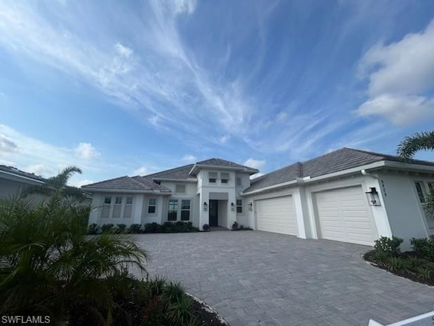 MOVE IN READY! Pickleball courts are open!  Come see this Covington III floor plan with the bonus room. This home offers a gas kitchen cooktop and outdoor kitchen in nearly 800 square feet of covered lanai living space and a beautiful custom pool and spa package with a private landscaped view. Many options and upgrades. Caymas is set on 780 magnificent acres in a prime Naples location, offering an incomparable waterfront lifestyle in an unmatched setting enriched by exclusive amenities in a stunning 30,000 sq ft clubhouse offering a golf simulator, private theater, billiards and indoor and outdoor dining and dog park with a lifestyle director already in place to offer a variety of ways to connect with friends and neighbors.