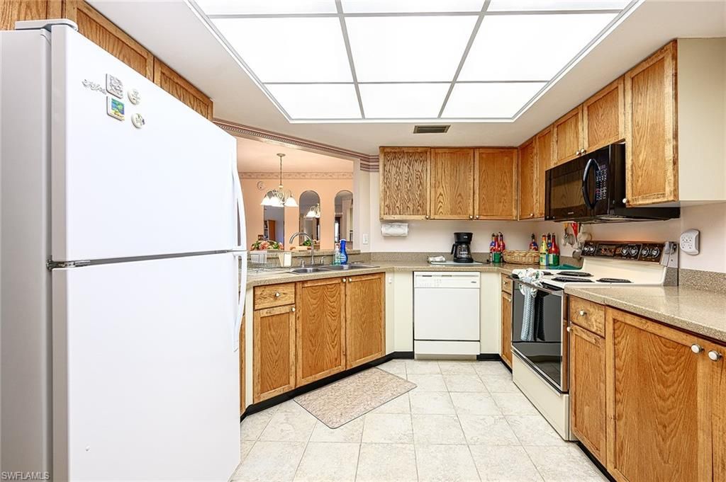 Photo of 586 Beachwalk CIR #O206, NAPLES, FL 34108 (MLS # 225074639)