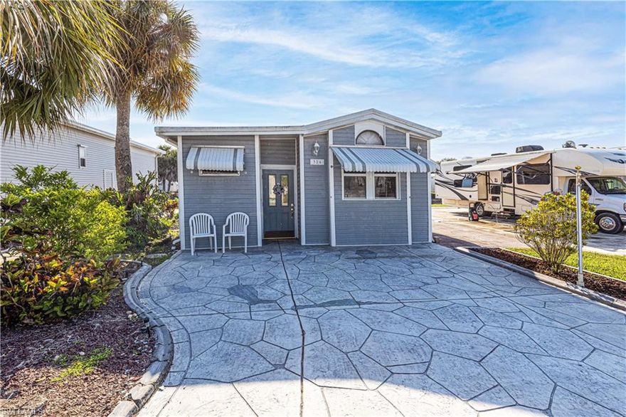 Located in lovely, gated, 55 plus Imperial Wilderness.  This home is on the "little" lake and faces east so you can enjoy the beautiful sunrises known for SWFL while sipping on your morning coffee.  It comes furnished so all you need to do is bring your toothbrush and move in.  It has 1 bedroom and 1 bath.  However, the sofa in the living room can be made into a bed for your guests.  A great bonus for this home is that the windows are tinted so you can enjoy your privacy.  The kitchen and dining rooms are quite open and spacious for this type of home. The bedroom is large enough to accommodate a king sized bed!  Come on over to Imperial Wilderness and check this beauty out.