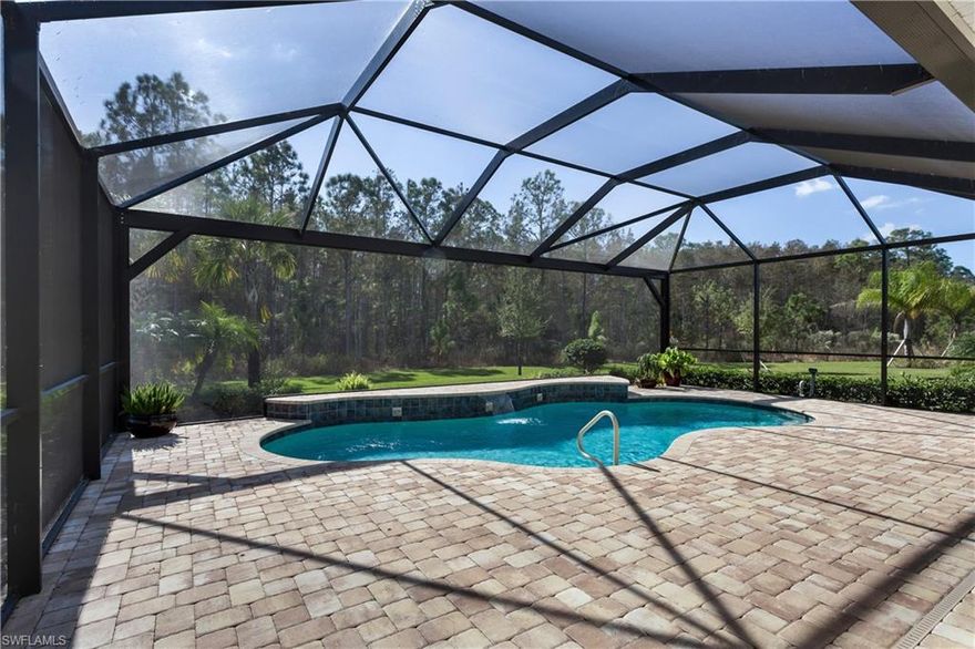 Wow! This popular 3B+Den "Vanderbilt" model is loaded with upgrades and has a premier location on an amazing 150' deep pie shaped lot at the end of a cul-de-sac! Beautiful wooded views and privacy plus on the serene preserve w/a huge paver lanai & expanded pool deck! This well designed open plan boasts 3 Bedrooms plus a den, a spacious open great room with a soaring coffered ceiling, a gourmet kitchen with beautiful Mocha cabinetry, flow through granite island, upgraded stainless appliances and breakfast nook w/extended cabinetry. Custom diagonal tile flooring throughout, 8 ft doors, plantation shutters, Spacious Master suite w/dual vanities & make up station, huge walk-in closet, oversized 3' extended garage & more! Enjoy the wonderful Southwest Florida lifestyle while entertaining on the oversized lanai & pool deck, cool off in the gorgeous custom pool w/waterfalls and enjoy the gorgeous preserve views with the "Picture Window" style pool cage!! This home has it all! Somerset at The Plantation is one of SW Florida's premier communities featuring top notch country club amenities, fitness, tennis, Hurdzan-Fry Championship golf, restaurant & minutes to shopping, dining & SWFL Int'l!