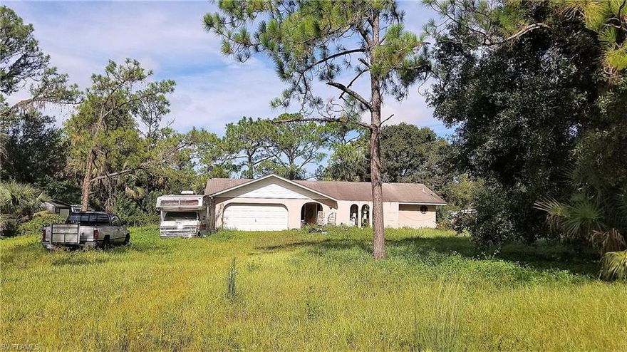 THIS IS A SHORT SALE requiring 3rd party approval.  This 3/2/2 home is zoned Ag-2 and sits on approximately 2.5 acres & is being sold AS-IS.  It has several repair issues that need addressed, it needs an investor/handyman/contractor to rehab the home, cash offers only please.  The well equipment does not work,  buyer will need to have this issue repaired post closing in order for the water to work.  The home is also part of an open Guardianship case, NO repairs will be made to the property whatsoever of any kind as part of the sale.  There is an enormous amount of personal belongings & debris both inside and outside of the property, buyer will be responsible for the removal of ANY AND ALL personal property that seller does not remove including but not limited to, debris, miscellaneous personal property, vehicles, boats, campers, trailers, etc., located on and about the premises as seller will not be removing many of these items from the property that may be left as part of the sale.  Seller does not have the titles to many or all of the vehicles, trailers, campers, etc. located on the property.