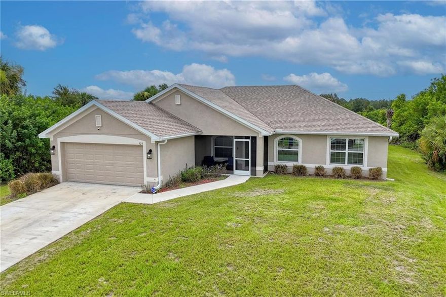 Welcome to your new home in the heart of Lehigh Acres! This 3-bed/2-baths+den single-family home offers ample living space and versatility for all your needs. Built in 2022, this home offers the latest design and construction standards, ensuring energy efficiency and contemporary style. The open-concept living and dining areas provide a welcoming atmosphere perfect for family gatherings and entertaining. There is a dedicated formal dining room and an additional den space that is ideal for a home office, playroom, or guest room – endless possibilities! This home is just minutes away from schools, parks, and shopping. Don't miss out on the opportunity to make this house your home. Schedule your showing today and experience the best of Lehigh Acres living!