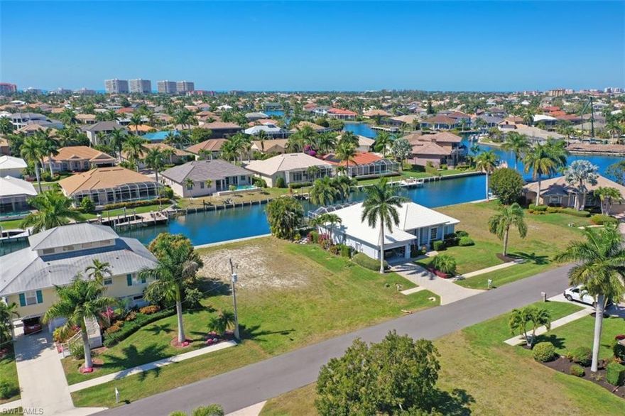Fabulous opportunity to build on desirable Marco Island with waterfront views! Surround yourself with gorgeous homes and build your dream home on this 80x110, western rear exposure lot. Water indirect access with just a short boat ride out to open water is every boaters dream Just minutes to Marco Islands top beaches, shopping, dining, and entertainment. Your piece of paradise awaits.