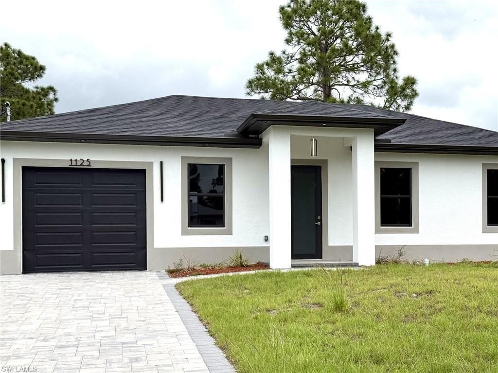 Photo of 1124 Cherry ST E, LEHIGH ACRES, FL 33974 (MLS # 226018346)