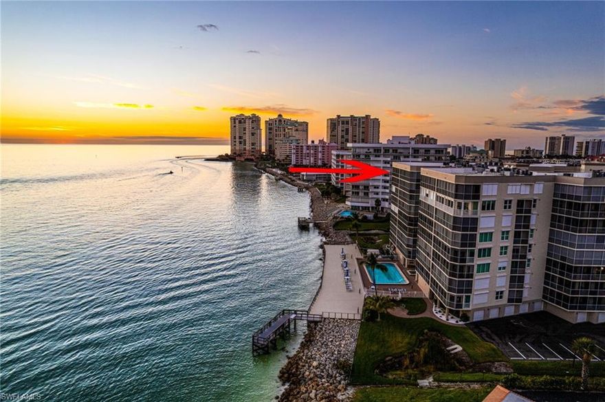 Experience Miami Modern in Marco Island in this extraordinary REMODELED PENTHOUSE WITH POOL CABANA AND 2 CAR GARAGE located in the exclusive GATED GULF-FRONT COMMUNITY of Mirage on the Gulf. This stunning residence offers over 3,100 square feet of beautifully updated living space with panoramic views of the Gulf of Mexico, Caxambas Pass, and the 10,000 Islands. From soaring sunsets to dolphins and manatees gliding by, the views begin the moment you walk in.  The light-filled open floor plan flows effortlessly to an expansive gulf-front lanai designed to maximize indoor-outdoor living. At the heart of the home, the chef’s kitchen features premium Italian cabinetry, swing-out storage, a large pantry, and a top-tier appliance package: Sub-Zero refrigerator, Sub-Zero wine cooler, Thermador cooktop, JennAir built-in oven, two Faber hoods, and four dishwasher drawers. A breakfast bar and separate dining area make hosting simple and seamless.  The primary en suite offers a private balcony, sitting area, large walk-in closet with custom built-ins, dual water closets (one with a bidet), a walk-in shower, and a soaking tub. Guest rooms are spacious and well appointed, including features such as built-in office cabinetry, a guest Murphy bed, and a surprise bedside "televator."  A major highlight is the just-remodeled PRIVATE POOLSIDE CABANA with a half bath—ideal for relaxing by the pool with added privacy and convenience. The residence also includes its own PRIVATE, UNDERGROUND TWO-CAR GARAGE, providing secure, weather-protected parking rarely available in condo living.  Mirage on the Gulf offers exceptional amenities, including a resort-style pool and spa, expansive sundeck, fishing pier, fitness center, tennis and pickleball courts, and a welcoming social room.  This penthouse combines luxury finishes, thoughtful upgrades, and unmatched water views—an opportunity to experience the best of Marco Island living with elevated Miami Modern style.
