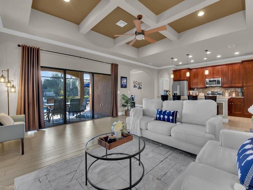 Welcome to this stunning, waterfront home with Gulf access and one bridge to open water. Perfectly positioned on a wider canal with beautiful views in both directions, come enjoy the ultimate in Florida lifestyle where boating, fishing, entertaining, dining and enjoyment come together in perfect harmony.
Built in 2015 and thoughtfully designed, this immaculate and tastefully decorated home is being offered turnkey so come inside and be wowed by its grand glass door entry, beautiful ceramic floor tiles leading to the open concept floor plan completed by soaring tray ceilings. This home features 3 spacious bedrooms, 2 full bathrooms plus a den, sparkling enclosed pool, a brand-new boat dock and lift, making it effortless to enjoy resort style living. Centrally located with quick access across both bridges to Fort Myers, RSW airport, beaches, local bars, restaurants, shops, grocery stores, top schools and hospitals make this location truly desireable. This home is NOT in a flood zone so come secure this beautiful home and make it yours - you deserve it!