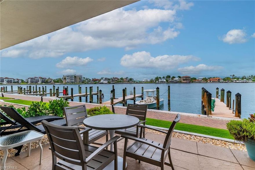 Beautifully remodeled, furnished condo overlooking the Marco River is waiting for its next owner. While you enjoy your morning coffee on your lovely patio, you will be entertained by leisurely passing boats and playful Dolphins greeting you for the day!! Bring your own boat and keep it at your deeded boat dock. The condo has been fully remodeled! The renovations to this condo include new beautiful bathrooms, a remodeled kitchen and new appliances, primed and ready for you to create fine meals. The new Bosch washer and dryer set is tucked away in the main bathroom for your convenience. New pocket doors were installed for the guest area to provide ample privacy. The modern renovations continue throughout the property with high baseboards and an attractive lighting system in the ceilings. Luxury vinyl plank flooring completes the picture of sophistication. If you are looking for an investment opportunity, this listing offers a compelling financial benefit. There are several bookings already in place for a buyer if they are interested in owning as an investment property. Whether you're seeking a personal vacation home, a profitable investment, or a new Florida lifestyle change, this home may be just what you are looking for. Marco Island is famous for its white sand beaches, fine dining and upscale shopping, and laid-back coastal vibe. This stunning condo is very reasonably priced and ready for a new owner!