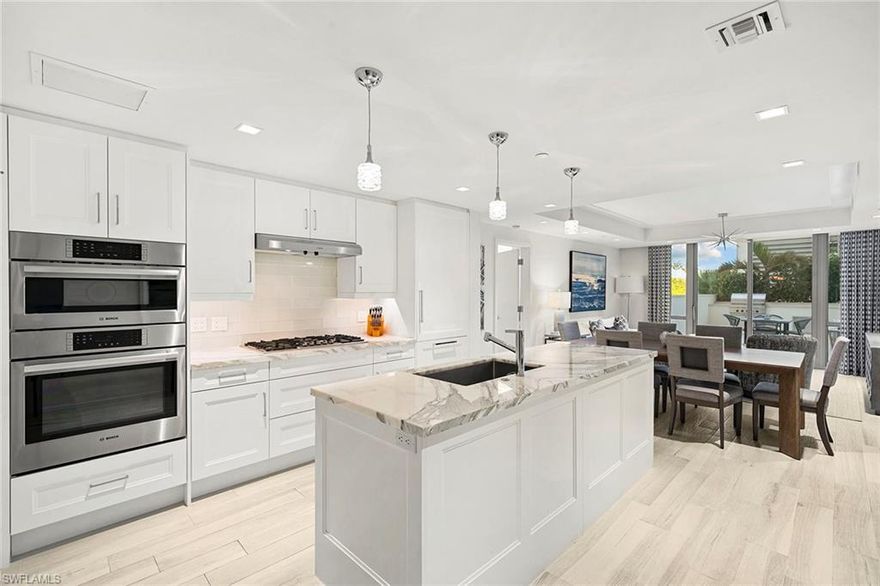 Act quickly to claim this exceptional residence at a great price in Mystique, Pelican Bay’s newest and most prestigious high-rise. Offered beautifully furnished, the home showcases refined finishes and a spacious open-concept layout designed for comfort and style. The kitchen is a standout, complete with premium appliances, a natural gas cooktop, marble countertops, custom cabinetry and pantry. Just beyond, the bright and inviting family room opens to a spectacular outdoor terrace with gas grill and large patio area, creating a seamless indoor-outdoor living experience. This residence’s remarkable highlight is its oversized terrace, thoughtfully designed with a luxurious outdoor kitchen and lush tropical landscaping, ideal for relaxing or entertaining. Residents of Mystique enjoy an elevated lifestyle with 24-hour front desk staffing and concierge services. Amenities include a resort-style pool and spa, tennis courts, fitness center, social and meeting spaces, a spa with infrared sauna and a private theater. Pelican Bay privileges further enhance the experience, offering access to beach club with beach chair and umbrella service, two beachfront restaurants, tennis and pickleball courts, a fitness center, lifelong learning programs, scenic recreational and biking paths, as well as canoeing and kayaking opportunities.