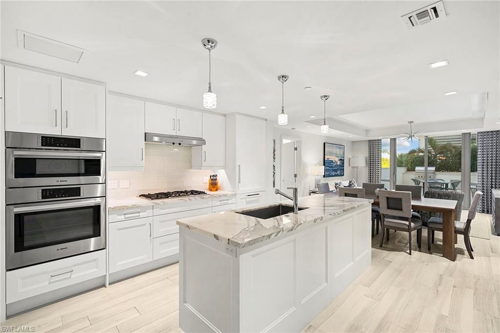 Photo of 6897 Grenadier BLVD #206, NAPLES, FL 34108 (MLS # 226012885)