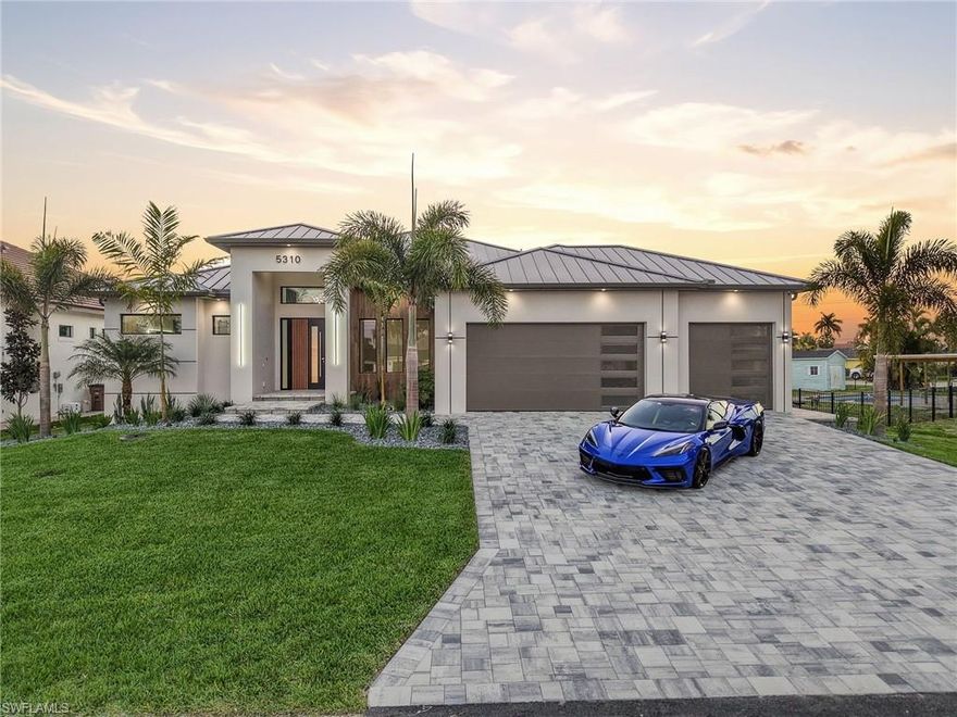 This stunning contemporary waterfront residence in Cape Coral delivers the ultimate Southwest Florida lifestyle, combining modern architecture, luxury finishes, and effortless access to the Gulf.  Designed for both entertaining and everyday comfort, the home features an expansive open floor plan anchored by a striking chef’s kitchen with a large waterfall island, custom cabinetry, and an impressive walk-in pantry. The living and dining areas flow seamlessly into the outdoor living space through expansive glass doors, creating a true indoor-outdoor experience.  Step outside to a resort-style lanai designed for year-round enjoyment. The spacious covered porch overlooks the pool and heated spa, while the outdoor kitchen with built-in grill and sink makes hosting effortless. A cozy outdoor fireplace and fire pit seating area create the perfect setting for relaxing evenings along the water.
Inside, the home offers a thoughtfully designed layout with a private den, elegant dining space, and a luxurious primary suite featuring a spa-inspired bathroom and expansive custom closet. Additional guest accommodations provide comfort and privacy for visitors.  The oversized garage with epoxy flooring offers both durability and a polished finish.  Situated on a Gulf-access canal, this exceptional property places boating, waterfront sunsets, and the best of the Cape Coral lifestyle right at your doorstep.

This is modern coastal luxury at its finest.