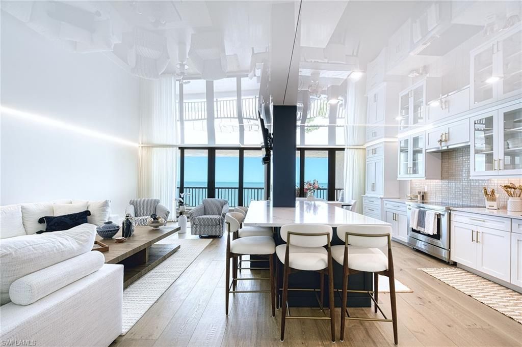 Photo of 2389 Gulf Shore BLVD N #302, NAPLES, FL 34103 (MLS # 225076314)